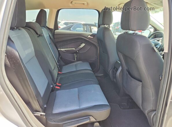1FMCU0GD0HUE13868 2017 FORD ESCAPE Silver Vista de los asientos traseros