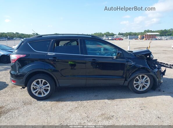 1FMCU0GD0JUC40911 2018 FORD ESCAPE Black Rear interior view