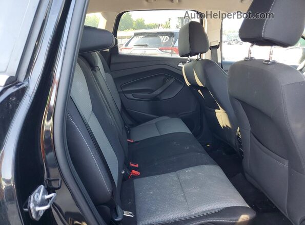 1FMCU0GD1HUA93279 2017 FORD ESCAPE Black Widok tylnych siedzeń
