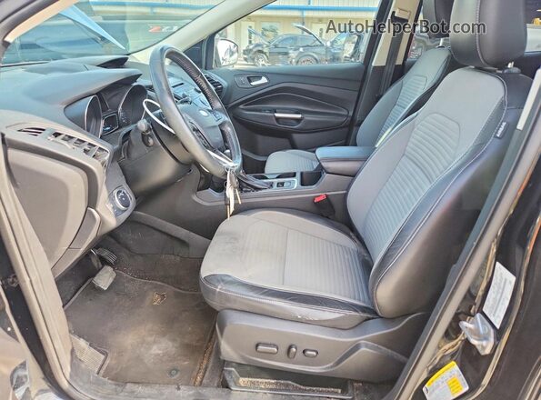 1FMCU0GD2JUB08801 2018 FORD ESCAPE Black Front interior view