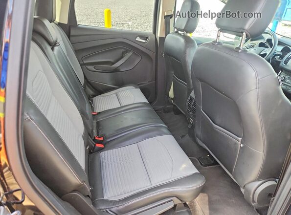 1FMCU0GD2JUB08801 2018 FORD ESCAPE Black Rear interior view