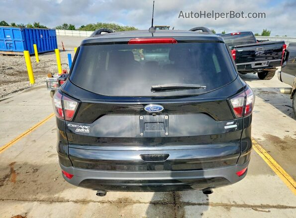 1FMCU0GD2JUB08801 2018 FORD ESCAPE Black Rear view