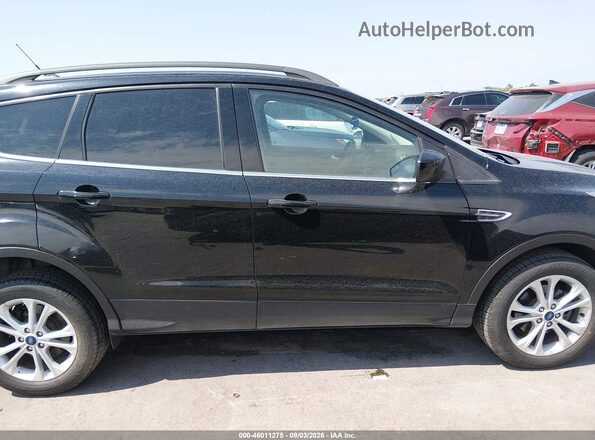 1FMCU0GD2JUD29038 2018 FORD ESCAPE Black Widok wnętrza z tyłu