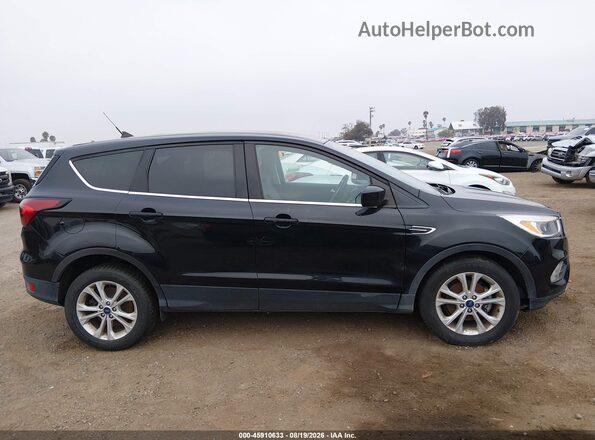 1FMCU0GD2KUC54925 2019 FORD ESCAPE Black Rear interior view