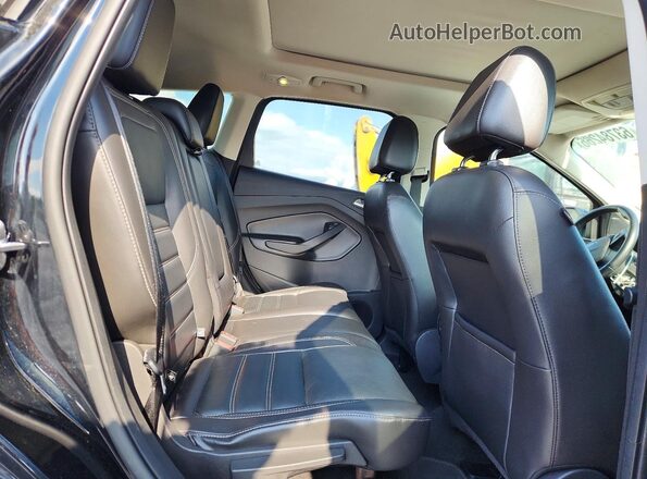 1FMCU0GD4HUA84110 2017 FORD ESCAPE Black Vista de los asientos traseros