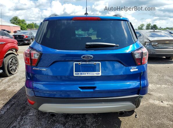 1FMCU0GD4HUD78901 2017 FORD ESCAPE Blue Vista trasera