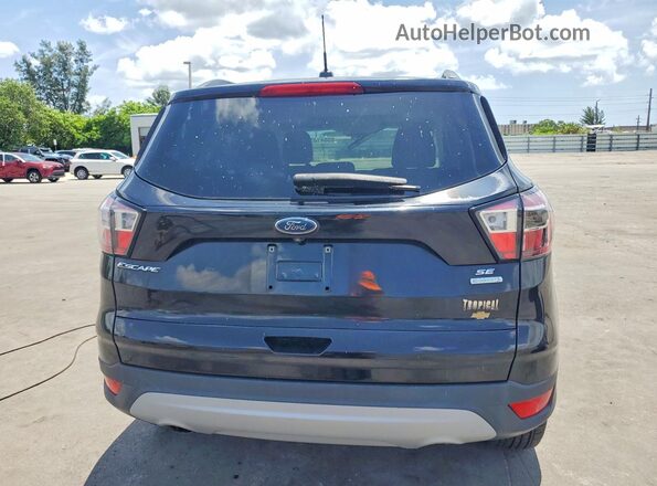1FMCU0GD4JUC61311 2018 FORD ESCAPE Черный Вид сзади