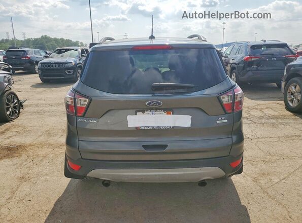 1FMCU0GD4JUD26710 2018 FORD ESCAPE Gray Rear view