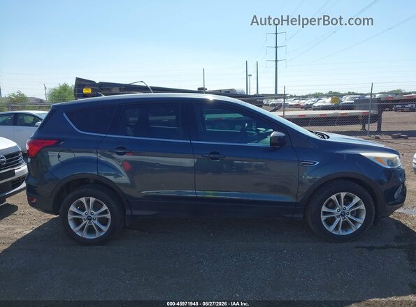 1FMCU0GD4KUA54029 2019 FORD ESCAPE Blue Вид задньої частини салону