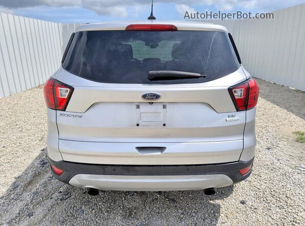 1FMCU0GD4KUB30994 2019 FORD ESCAPE Silver Widok z tyłu
