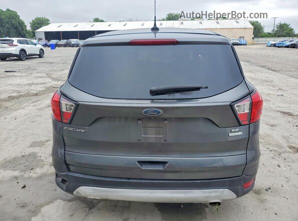 1FMCU0GD4KUB57158 2019 FORD ESCAPE Gray Rear view
