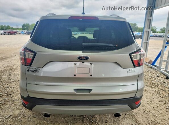 1FMCU0GD5JUB09831 2018 FORD ESCAPE Silver Widok z tyłu