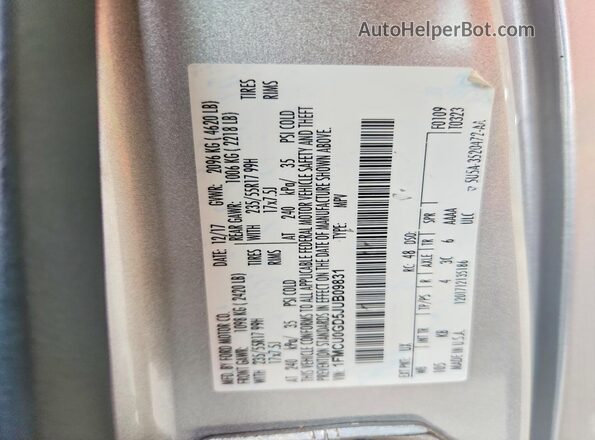 1FMCU0GD5JUB09831 2018 FORD ESCAPE Silver Widok naklejki z numerem VIN