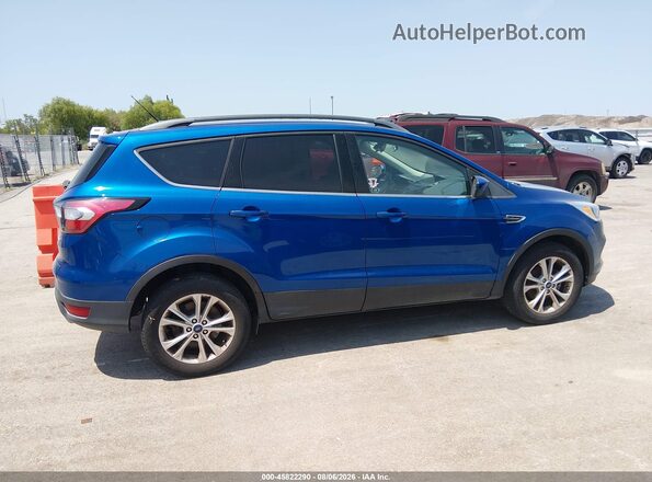 1FMCU0GD5JUD21919 2018 FORD ESCAPE Blue უკანა სალონის ხედი