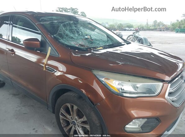 1FMCU0GD7HUB19724 2017 FORD ESCAPE Brown Vista del cuadro de instrumentos