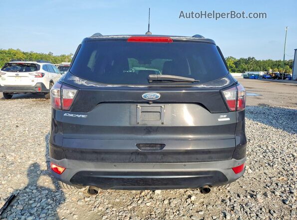 1FMCU0GD7HUD16036 2017 FORD ESCAPE Black Rear view