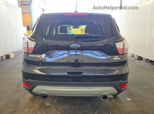 1FMCU0GD7HUF02630 2017 FORD ESCAPE Black Вид салону спереду