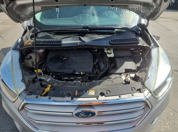 1FMCU0GD7JUA73348 2018 FORD ESCAPE Серебряный Вид задней части салона