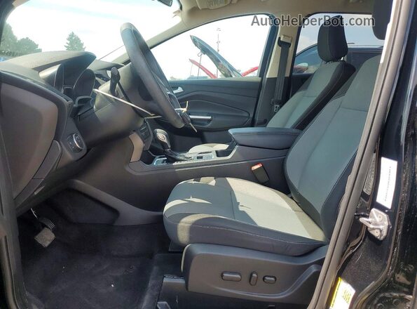 1FMCU0GD7JUB10253 2018 FORD ESCAPE Black Front interior view
