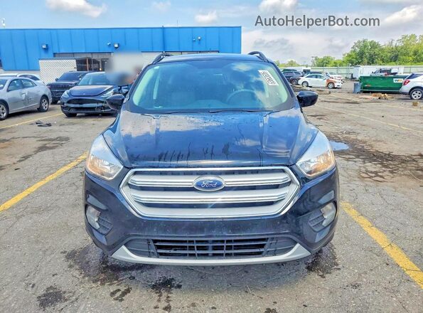 1FMCU0GD7JUB10253 2018 FORD ESCAPE Black Front view
