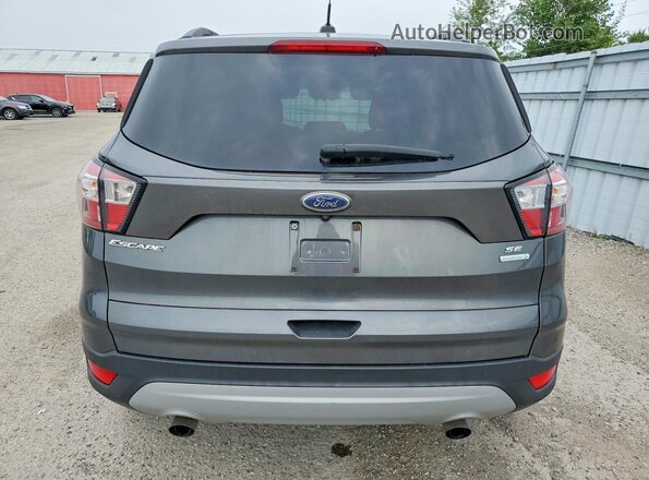 1FMCU0GD7JUB57802 2018 FORD ESCAPE Серый Вид сзади