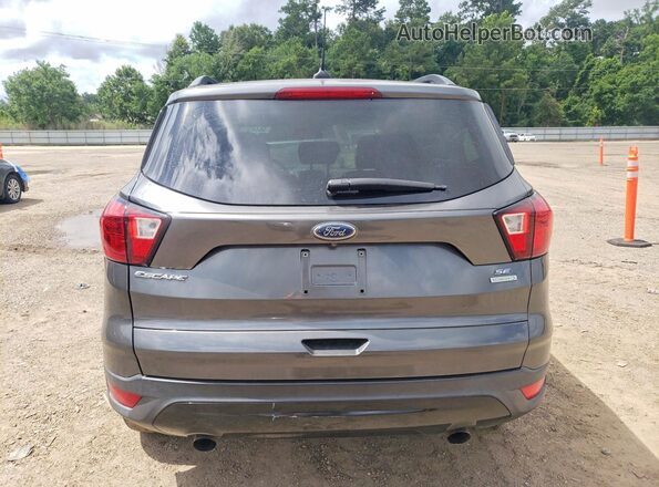 1FMCU0GD7KUA50282 2019 FORD ESCAPE Серый Вид сзади
