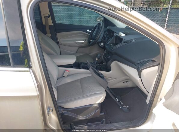 1FMCU0GD8HUE87104 2017 FORD ESCAPE Gold Vista interior delantera