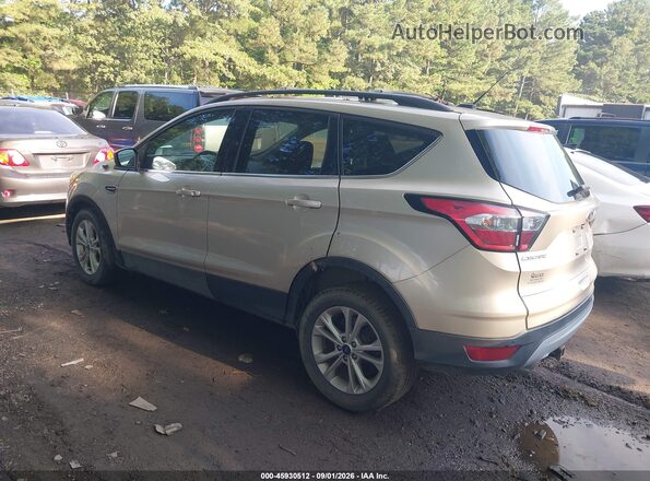 1FMCU0GD8HUE87104 2017 FORD ESCAPE Gold Trasero izquierdo