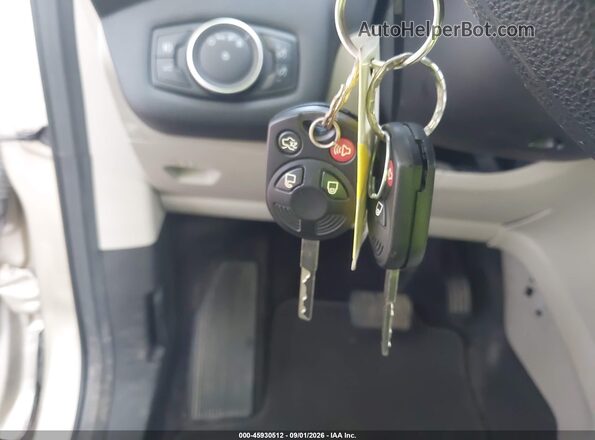 1FMCU0GD8HUE87104 2017 FORD ESCAPE Gold Vista del salpicadero