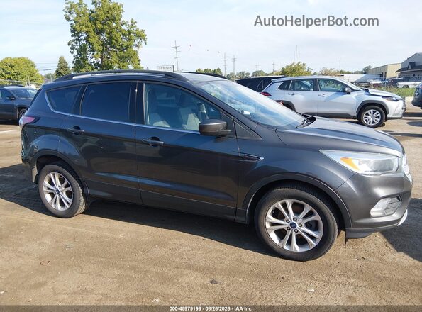 1FMCU0GD8JUA03258 2018 FORD ESCAPE Gray უკანა სალონის ხედი