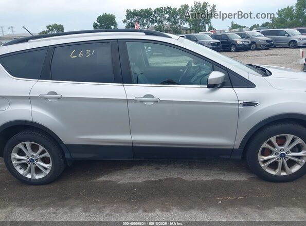 1FMCU0GD8JUA94953 2018 FORD ESCAPE Silver უკანა სალონის ხედი