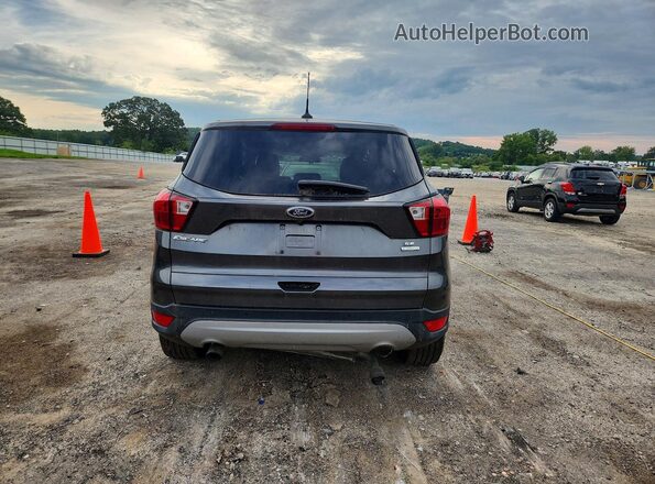 1FMCU0GD8KUB13082 2019 FORD ESCAPE Silver Rear view