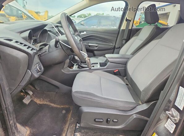 1FMCU0GD8KUB13082 2019 FORD ESCAPE Silver Front interior view
