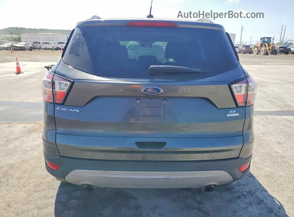 1FMCU0GD9HUD93409 2017 FORD ESCAPE Gray Vista trasera