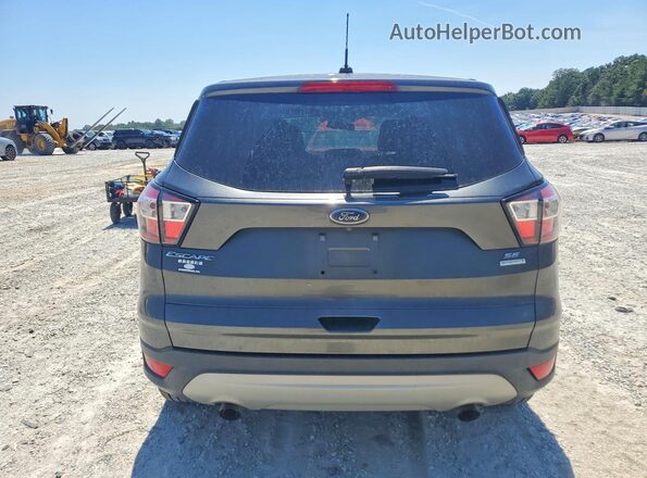 1FMCU0GD9HUE05512 2017 FORD ESCAPE Gray Widok wnętrza z przodu