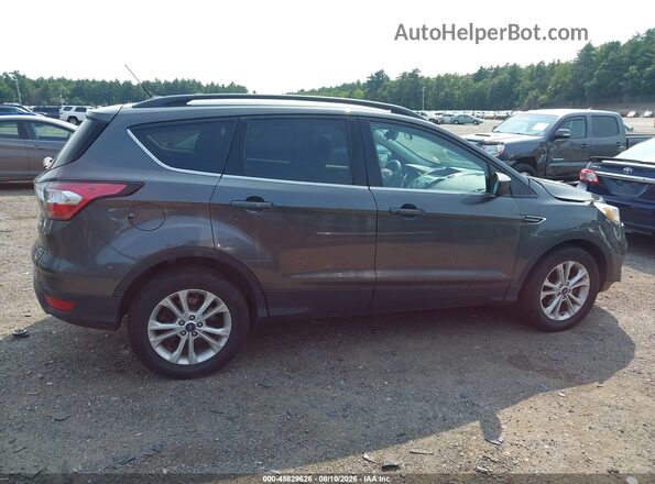 1FMCU0GD9JUC10970 2018 FORD ESCAPE Gray Widok wnętrza z tyłu