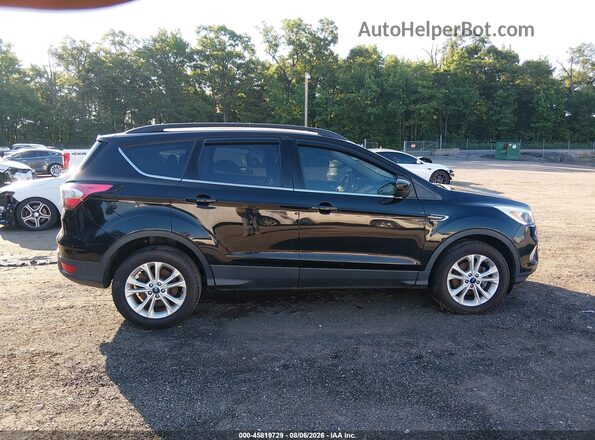 1FMCU0GDXJUB46499 2018 FORD ESCAPE Black Вид задньої частини салону