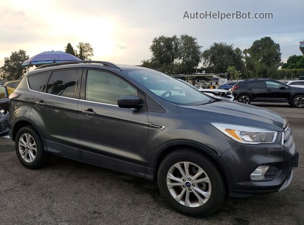1FMCU0GDXJUD21964 2018 FORD ESCAPE Gray Rear view