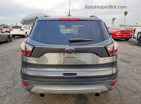 1FMCU0GDXJUD21964 2018 FORD ESCAPE Gray Rear seats view