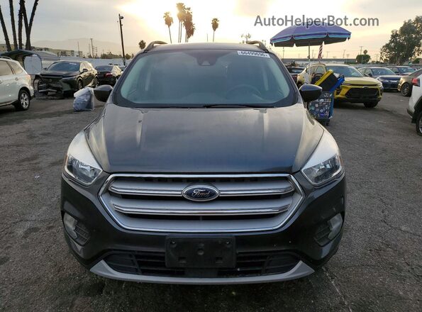 1FMCU0GDXJUD21964 2018 FORD ESCAPE Gray Dashboard view