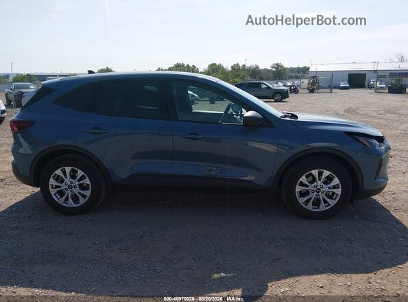 1FMCU0GN0SUB21413 2025 FORD ESCAPE Light Blue Widok wnętrza z tyłu