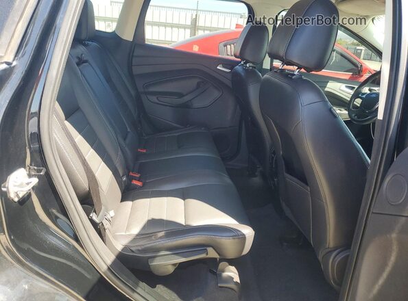 1FMCU0GX1GUB67017 2016 FORD ESCAPE Черный Вид задней части салона