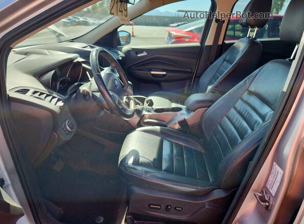 1FMCU0GX2GUC20078 2016 FORD ESCAPE Silver Front interior view