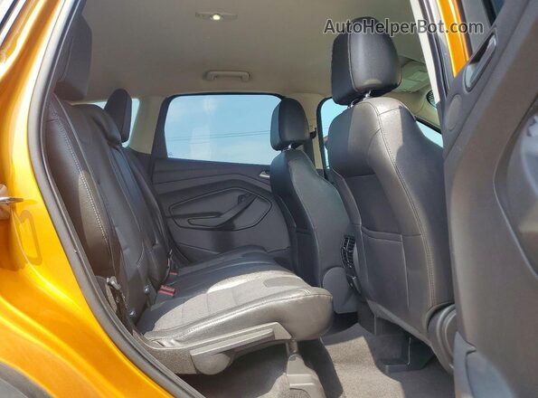 1FMCU0GX9GUB22603 2016 FORD ESCAPE Orange Rear interior view
