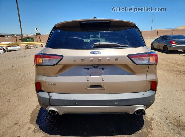 1FMCU0H68MUB05079 2021 FORD ESCAPE Золотой Вид сзади