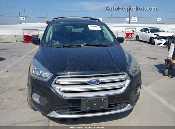 1FMCU0HD2JUA86295 2018 FORD ESCAPE Black Вид задньої частини салону