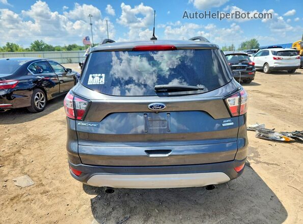 1FMCU0HD6JUD35911 2018 FORD ESCAPE Gray Vista trasera