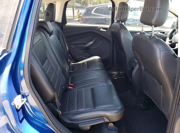 1FMCU0HD7JUB16777 2018 FORD ESCAPE Blue Vista interior trasera