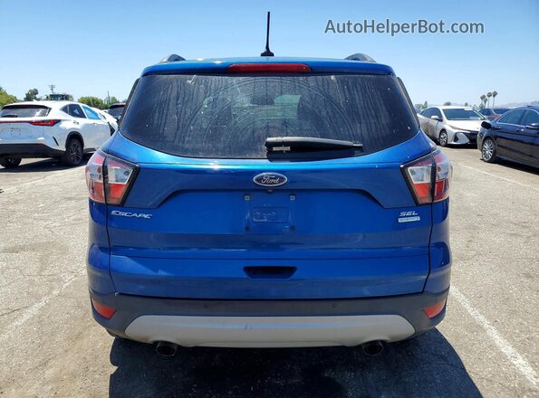 1FMCU0HD7JUB16777 2018 FORD ESCAPE Blue Vista trasera