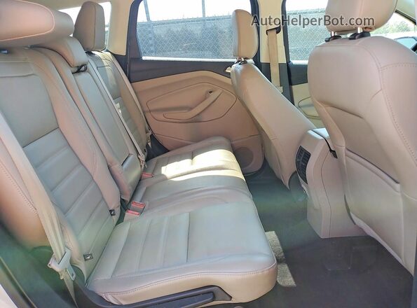 1FMCU0HD8JUD14719 2018 FORD ESCAPE Silver Rear seats view